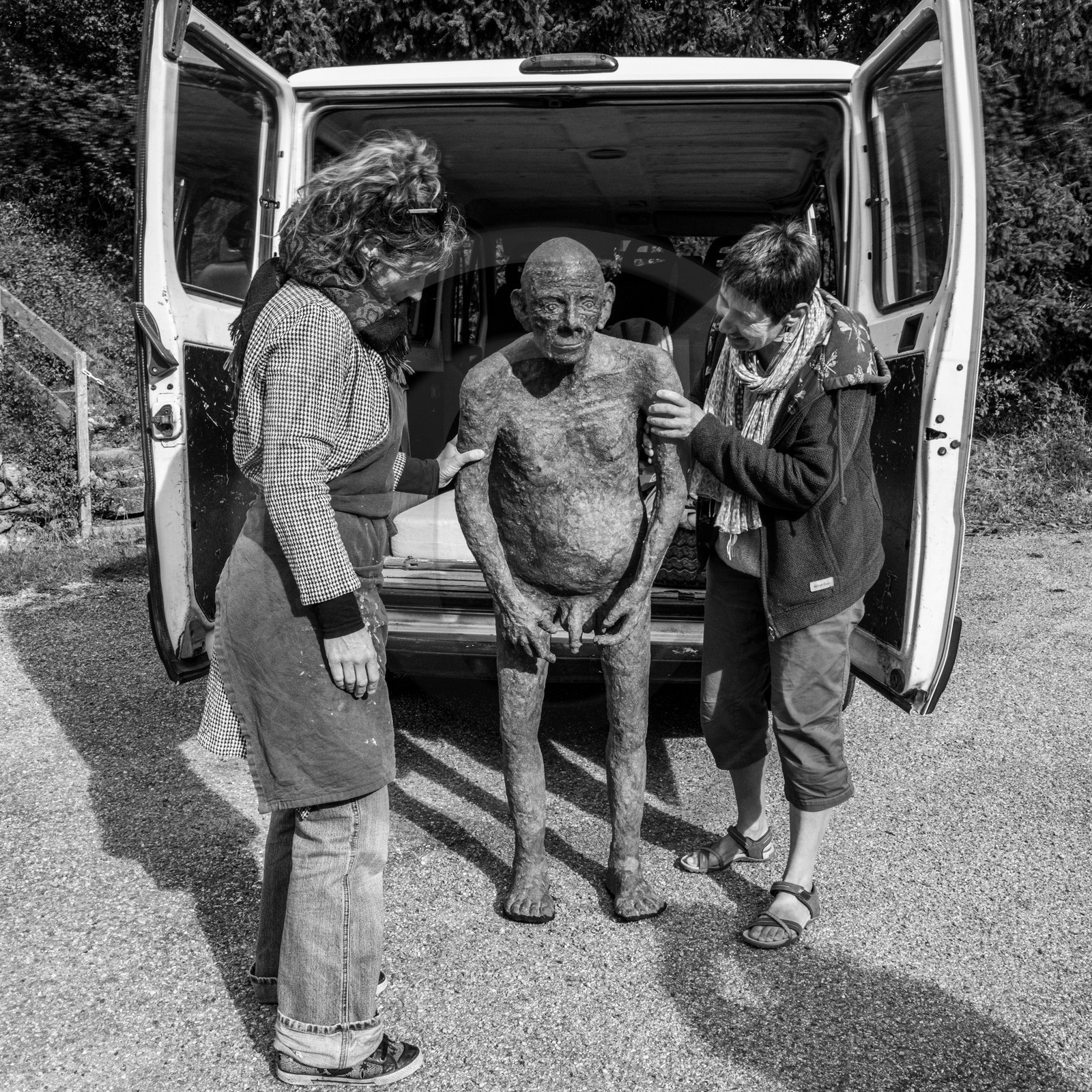 Création de l'homme de l'Ouort Marcel Joli Coeur : pose d'un enduit noir