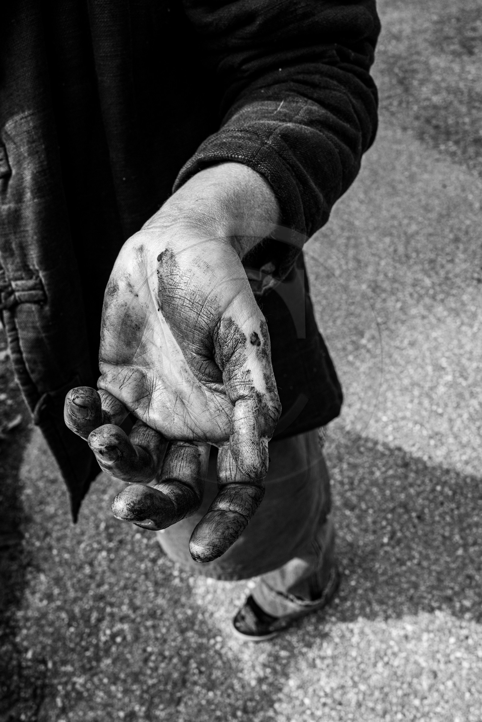 Création de l'homme de l'Ouort Marcel Joli Coeur : pose d'un enduit noir